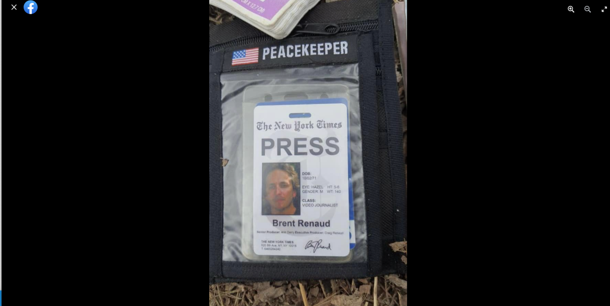 Brent Renaud's New York Times press pass in a pouch with a U.S. flag and labeled Peacekeeper.