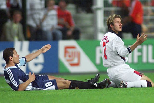 <p>GERARD CERLES/AFP/Getty</p> David Beckham and Diego Simeone react after foul play by Beckham during the 1998 FIFA World Cup.