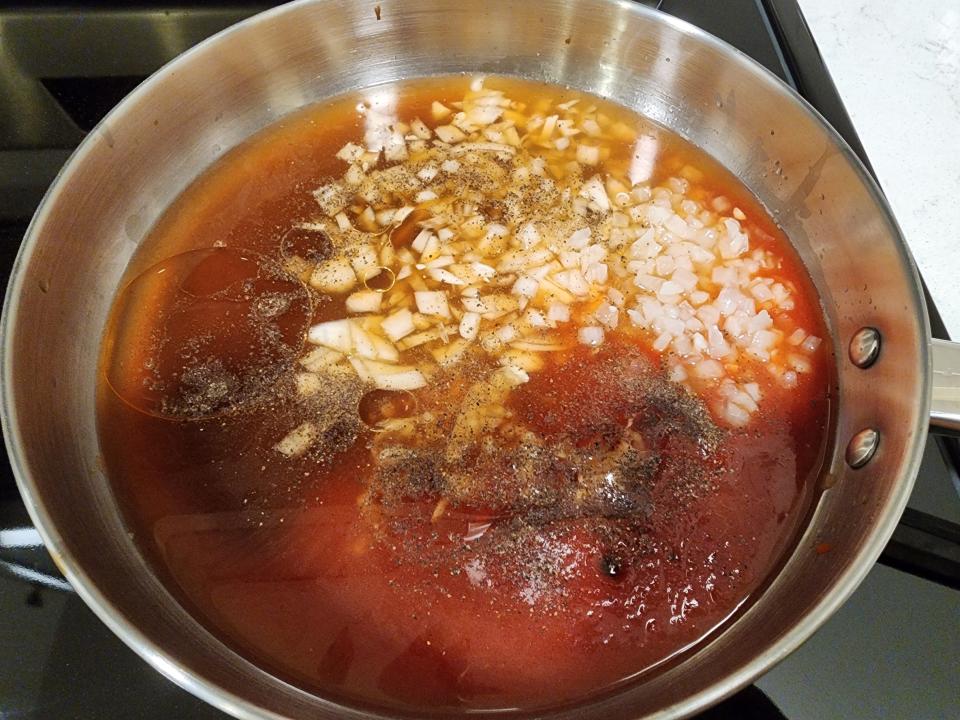 ingredients for rachael ray's bbq sauce in pan over the stove