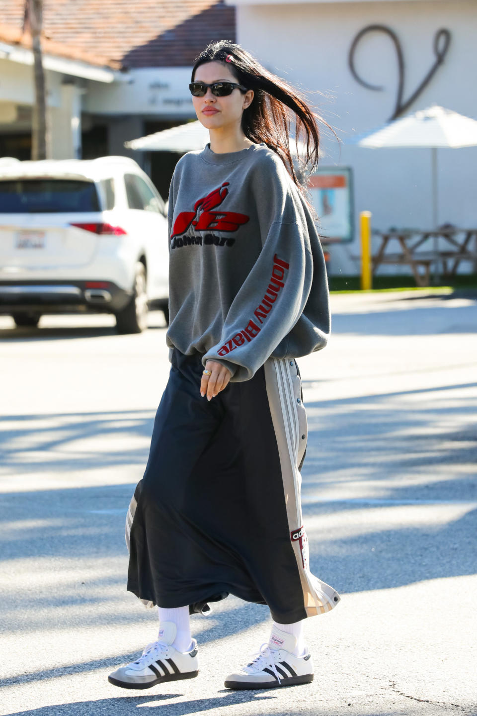 Amelia Hamlin wears loungewear including a long Adidas skirt