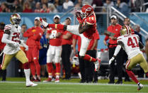 Kansas City Chiefs wide receiver Sammy Watkins (14) catches a pass between San Francisco 49ers defensive back Emmanuel Moseley (41) and strong safety Jaquiski Tartt (29) in the first half of Super Bowl 54 on Feb. 2, 20202 at Hard Rock Stadium in Miami Gardens, FL. (Tammy Ljungblad/Kansas City Star/Tribune News Service via Getty Images)