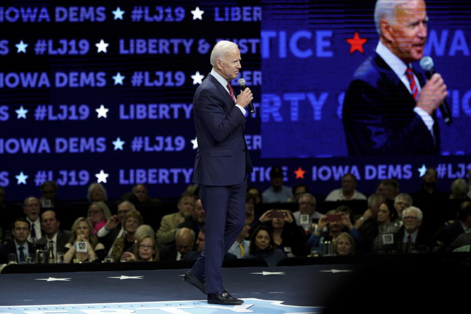 FILE - In this Friday, Nov. 1, 2019 file photo, Democratic presidential candidate, former Vice President Joe Biden, speaks during the Iowa Democratic Party's Liberty and Justice Celebration in Des Moines, Iowa. On Friday, Nov. 8, 2019, The Associated Press reported on stories circulating online incorrectly asserting that Biden forgot where the camera was and spoke to a screen in front of him instead during the forum. After the event, social media users began circulating a C-Span clip which appeared to show Biden, 76, talking to a screen instead of an audience. In actuality, Biden, who was standing on an elevated stage, was speaking to an audience surrounding him at tables below _ out of view from the camera angle. (AP Photo/Nati Harnik)