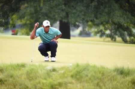 White Sulphur Springs, WV, USA; Tiger Woods on the 16th green at The Old White TPC. Mandatory Credit: Bob Donnan-USA TODAY Sports