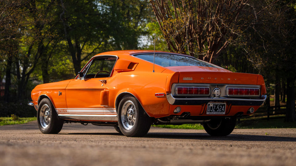 A 1968 Shelby GT500KR Fastback in Special Light Orange.