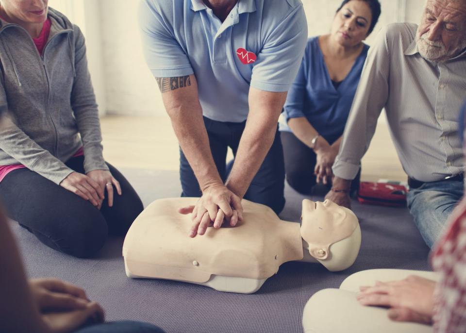 Demonstration of CPR on a first aid dummy. CPR is the act of applying pressure to the heart manually, until its normal rhythm and activity resumes. (Shutterstock)
