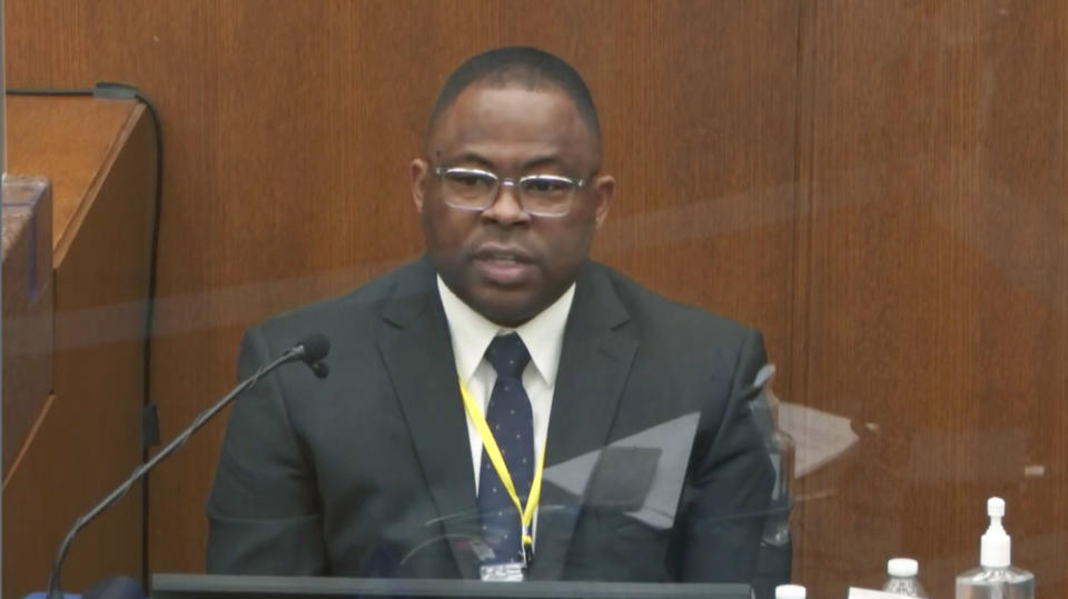 In this image from video, witness Jody Stiger, a Los Angeles Police Department sergeant, testifies as Hennepin County Judge Peter Cahill presides Wednesday, April 7, 2021, in the trial of former Minneapolis police Officer Derek Chauvin at the Hennepin County Courthouse in Minneapolis. Chauvin is charged in the May 25, 2020 death of George Floyd. (Court TV via AP, Pool)