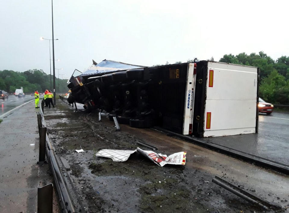 The aftermath of the lorry crash between Junction 7 and 8 of the M25 (Picture: SWNS)