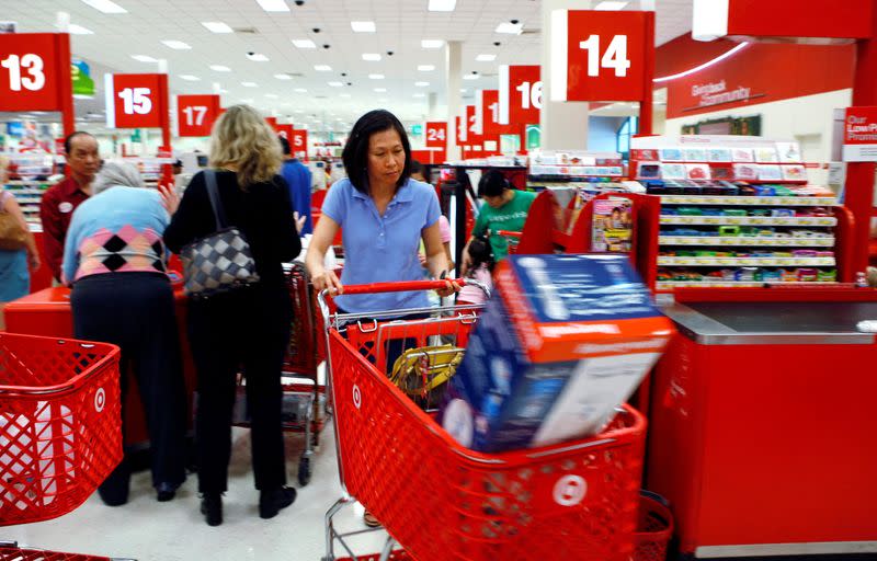 FILE PHOTO: Shoppers checkout at a Target store in Virginia