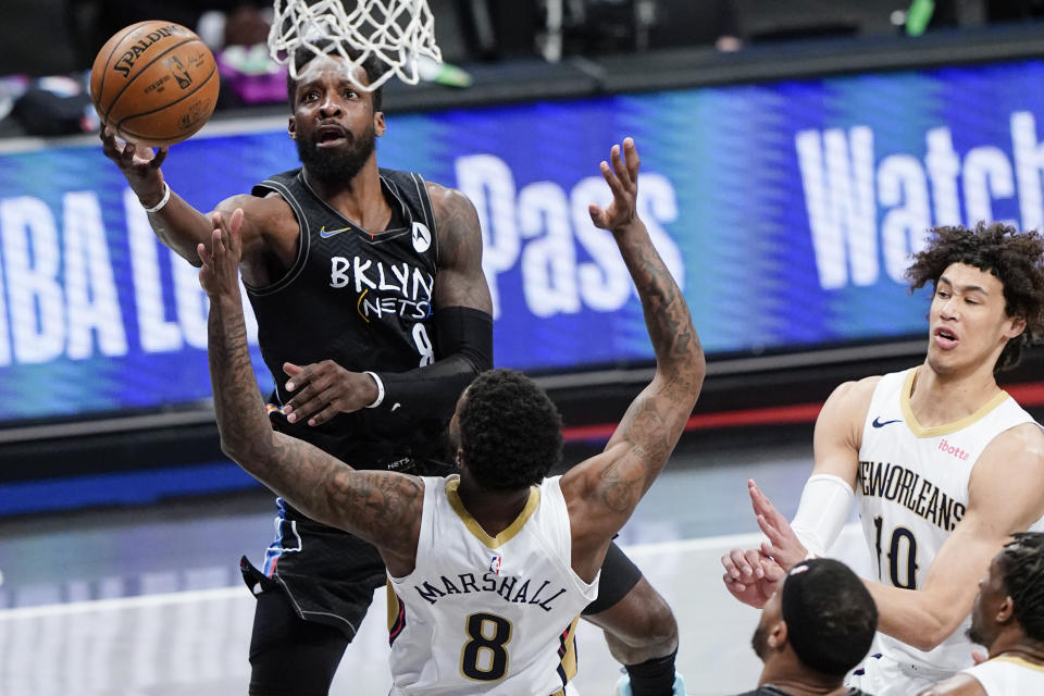Brooklyn Nets' Jeff Green (8) shoots over New Orleans Pelicans' Naji Marshall (8) as Jaxson Hayes (10) reacts during the first half of an NBA basketball game Wednesday, April 7, 2021, in New York. (AP Photo/Frank Franklin II)