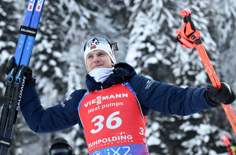 Norway's Vetle Sjaastad Christiansen celebrates after winning the Men's 10km sprint event of the IBU Biathlon World Cup in Ruhpolding. Sven Hoppe/dpa