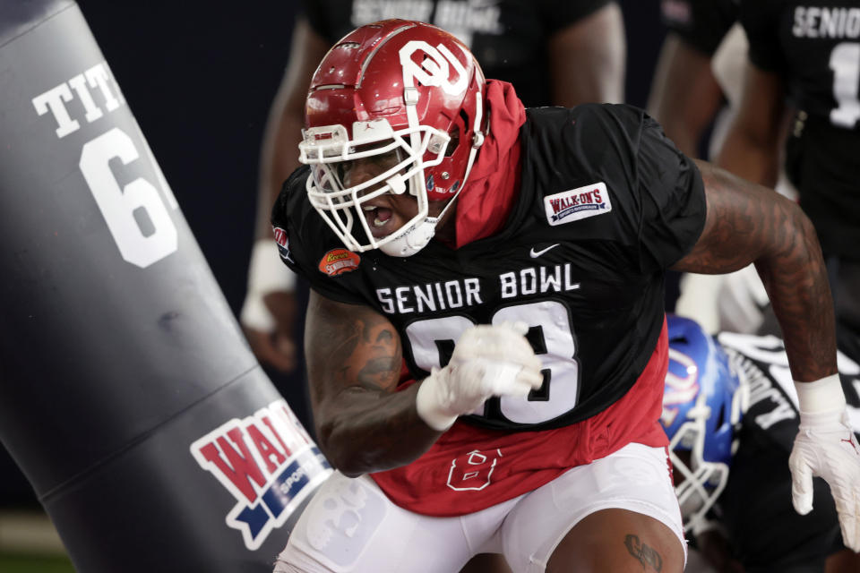 National Team defensive lineman Perrion Winfrey of Oklahoma (98) runs through drills during practice for the Senior Bowl NCAA college football game Thursday, Feb. 3, 2022, in Mobile, Ala. (AP Photo/Butch Dill)