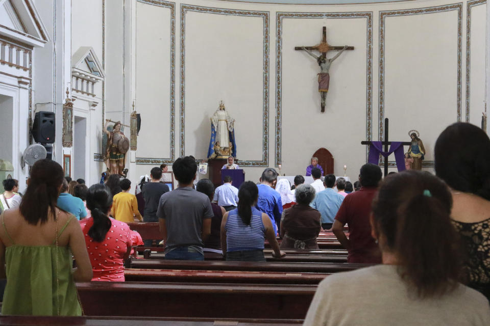 People attend Mass at the Cathedral in Chilpancingo, Mexico, Thursday, Feb. 15, 2024. Four Roman Catholic bishops met with Mexican drug cartel bosses in a bid to negotiate a possible peace accord, according to the Bishop of Chilpancingo-Chilapa, José de Jesús González Hernández. (AP Photo/Alejandrino Gonzalez)