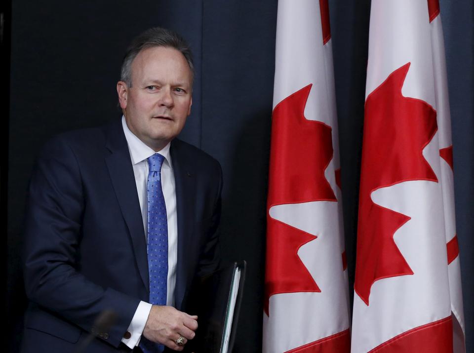 Bank of Canada Governor Stephen Poloz arrives at a news conference upon the release of the Monetary Policy Report in Ottawa April 15, 2015. The Bank of Canada held its benchmark interest rate steady on Wednesday, saying the economy will pick up as non-energy exports and labor markets strengthen even though the oil price crash probably cut economic growth to zero in the first quarter. REUTERS/Chris Wattie