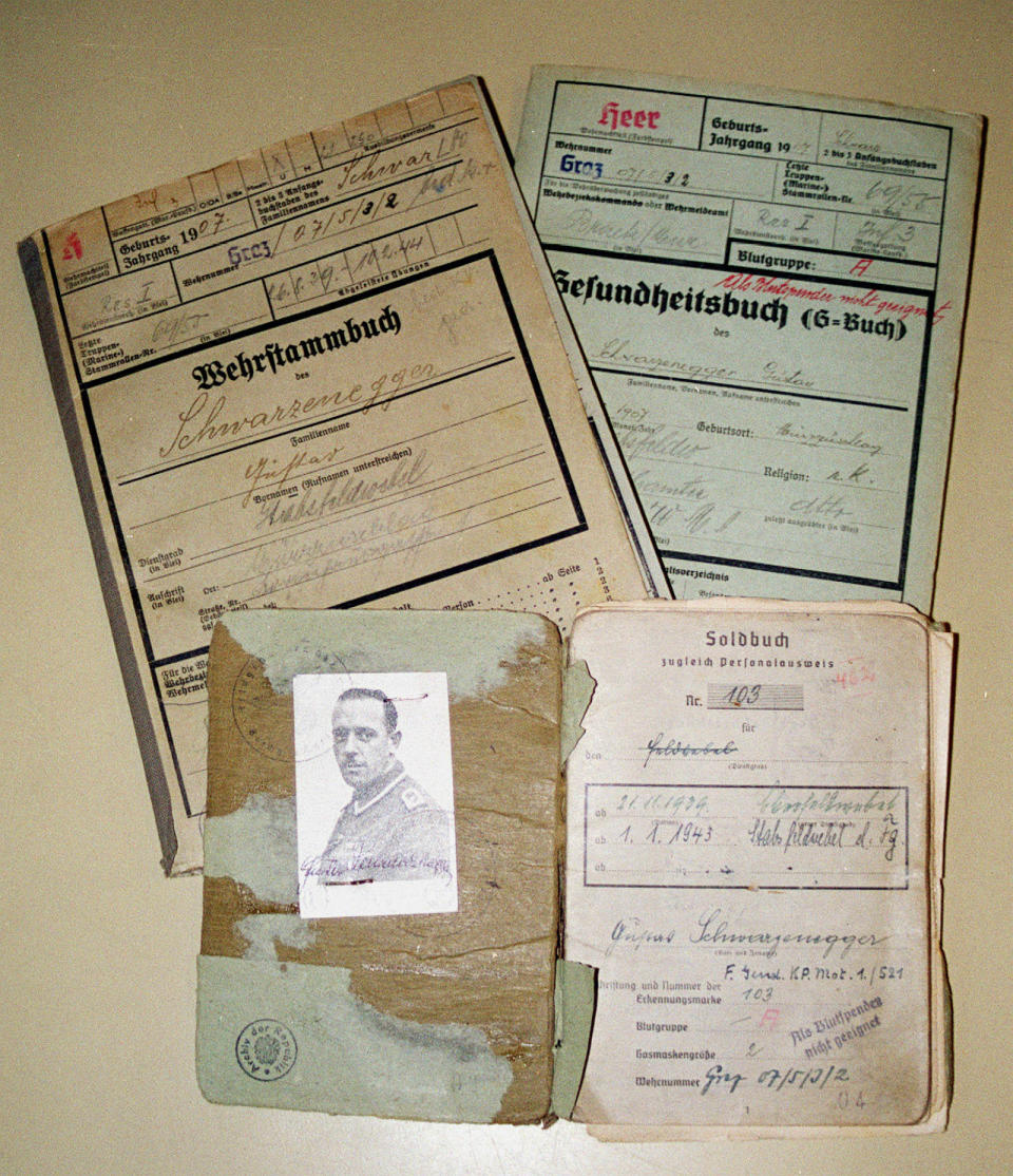 Gustav Schwarzenegger's soldiers book and other documents, pictured on Wednesday, Aug. 20, 2003, which he carried in his left shirt pocket while fighting for the Germans during World War II. The book is now stored at the Austrian State Archives, home to millions of Nazi-era documents.  / Credit: SUSANNA LOOF / AP