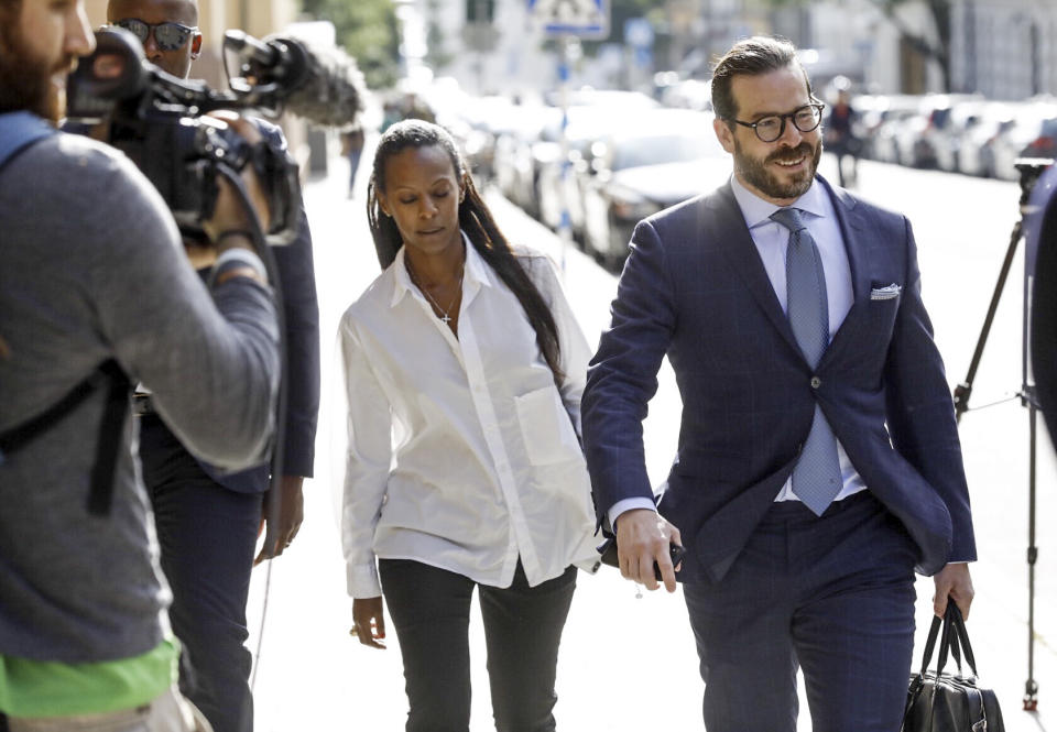 Swedish PR consultant Lili Assefa left, and US rapper A$AP Rocky's defence lawyer Slobodan Jovicic, arrive at the district court in Stockholm, during the second day of his trial, Thursday, Aug. 1, 2019. A$AP Rocky, real name Rakim Mayers testified Thursday at his assault trial in Sweden that he did everything possible to avoid conflict with two men he said persistently followed his entourage in Stockholm, saying that one of the men picked a fight with one of his bodyguards. (Fredrik Persson/TT News Agency via AP)