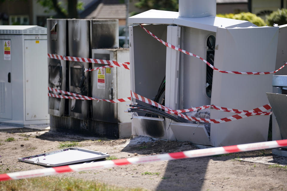 LIVERPOOL, ENGLAND - MAY 28: Fire and explosion damage can be seen on an EE network 5G mast that was attacked by an arsonist earlier this week in Brodie Avenue on May 28, 2020 in Liverpool, England. A lot of the damage was caused by the resulting explosion when the petrol was ignited. Several phone masts have been deliberately damaged around the UK, their attackers inspired by a conspiracy theory positing that 5G technology is linked to the spread of the coronavirus. (Photo by Christopher Furlong/Getty Images)