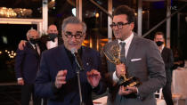 <p>Accepting for Outstanding Comedy Series, an elated <a href="https://ew.com/tag/dan-levy/" rel="nofollow noopener" target="_blank" data-ylk="slk:Dan Levy;elm:context_link;itc:0;sec:content-canvas" class="link ">Dan Levy</a> echoed Murphy by saying, “Our show at its core is about the transformational effects of love and acceptance and that is something we need more of now than ever before,” before becoming too excited and telling Eugene, “Dad, do the rest of the fun stuff!” </p> <p><a href="https://ew.com/tag/eugene-levy/" rel="nofollow noopener" target="_blank" data-ylk="slk:Eugene Levy;elm:context_link;itc:0;sec:content-canvas" class="link ">Eugene Levy</a> then took the mic and turned to his son, thanking him for having taken “our fish-out-of-water story about the Rose family, and transformed it into a celebration of inclusivity, a castigation of homophobia, and a declaration about the power of love. Thank you, Daniel.”</p>