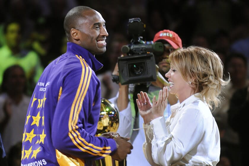 Kobe Bryant and Jeanie Buss.