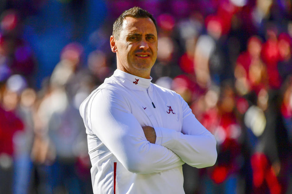 FILE - In this Nov. 9, 2019, file photo, Alabama offensive coordinator Steve Sarkisian watches warm-ups before an NCAA football game against LSU in Tuscaloosa, Ala. Sarkisian made the most of his final game with Alabama and three of the most dangerous weapons in college football during the College Football Playoff national championship game against Ohio State on Monday, Jan. 11, 2021. (AP Photo/Vasha Hunt, File)
