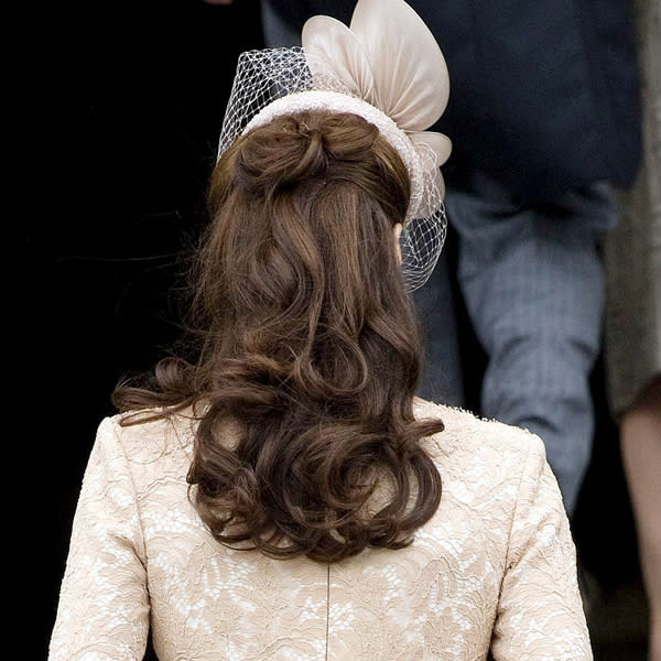 <b>Kate Middleton Top 10 Best Hairstyles: </b>Showing off a half-up, half-down look, Kate added volume with tumbling curls for a service at St Paul's in June ©Rex