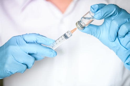 <span class="caption">The smallpox vaccine is currently being used to protect against monkeypox.</span> <span class="attribution"><a class="link " href="https://www.shutterstock.com/image-photo/doctor-researcher-scientist-hand-blue-glove-1396494821" rel="nofollow noopener" target="_blank" data-ylk="slk:PhotobyTawat/ Shutterstock;elm:context_link;itc:0;sec:content-canvas">PhotobyTawat/ Shutterstock</a></span>