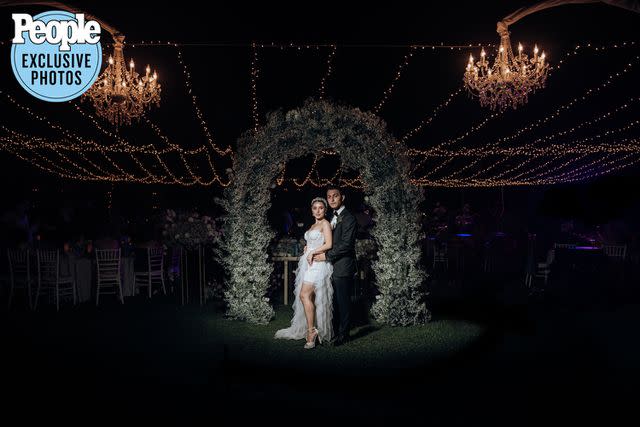 <p>Eduardo Mejia/Adventure Photos</p> Paul Karmiryan and Stella Mayilyan pose at their wedding.