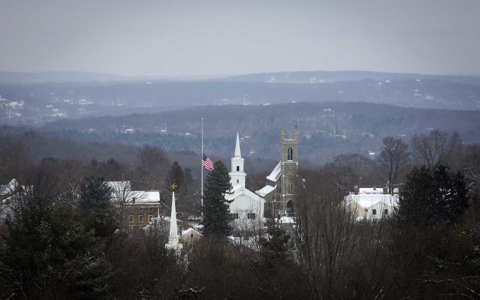 The town flag flies at half staff in Newtown, Connecticut