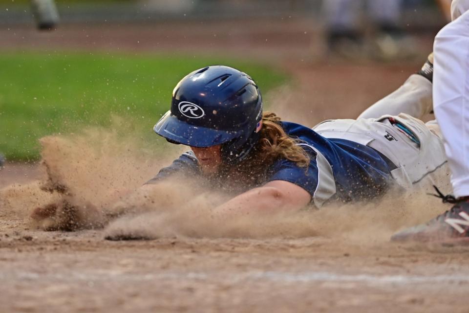 Rootstown's Jaggar Kokochak scores a run on a wild pitch in the fifth inning of their district semifinal against Cardinal Mooney at Cene Park in Struthers.
