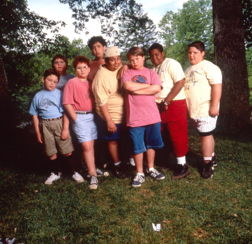 The cast of "Heavyweights" poses for a photo in the woods