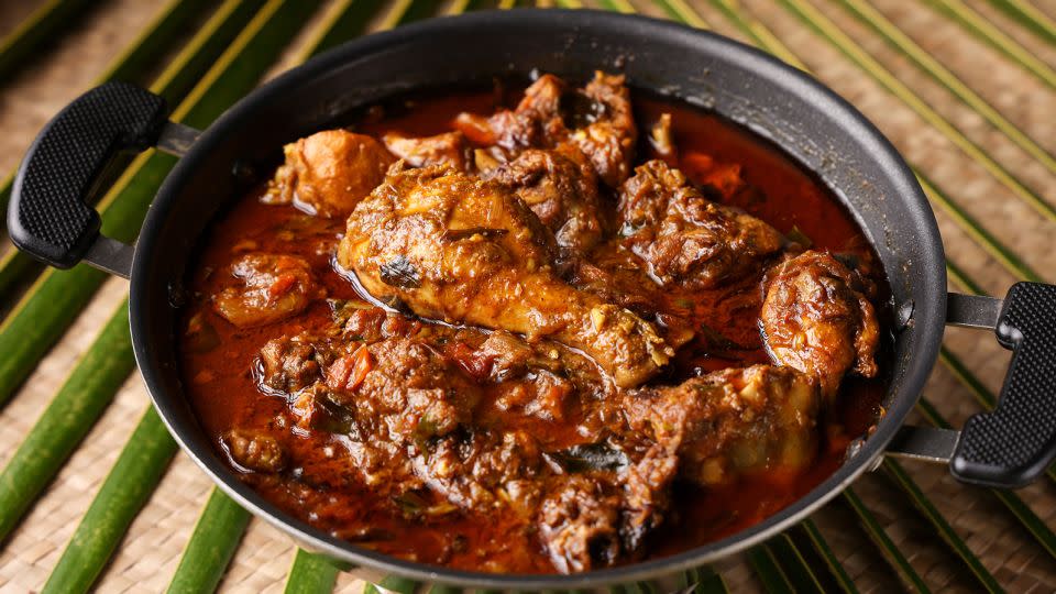 Chicken is simmered with roasted spices and coconut in this flavorful dish. - sanirimpan/Adobe Stock