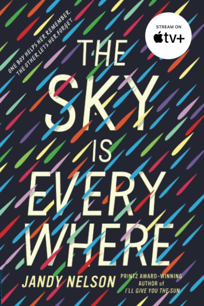 Multi-colored rain falling across the cover with title text in center