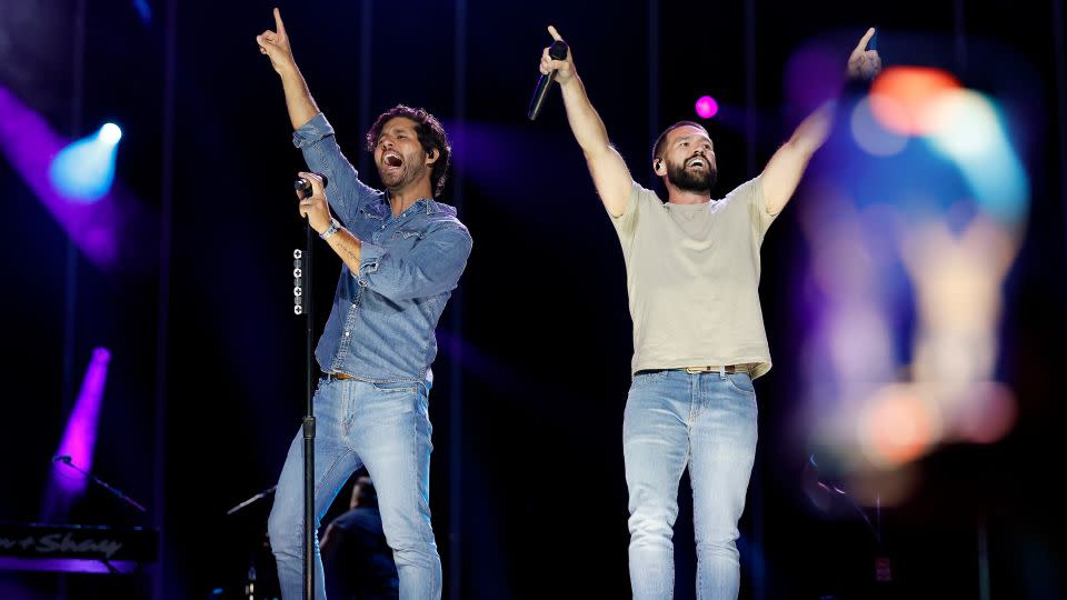 Dan Smyers and Shay Mooney of Dan + Shay performing in 2023. - Jason Kempin/Getty Images