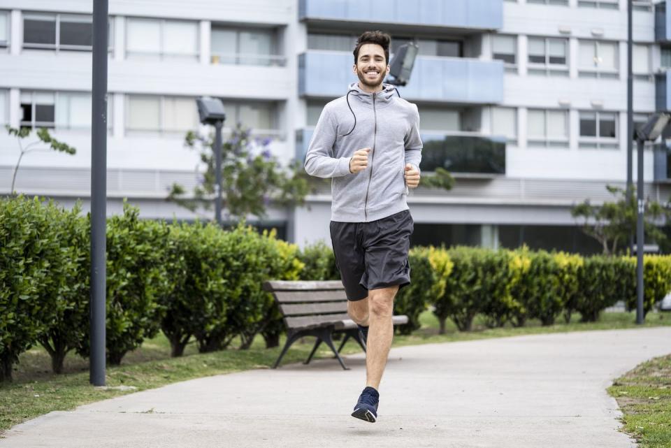 young man jogging in park