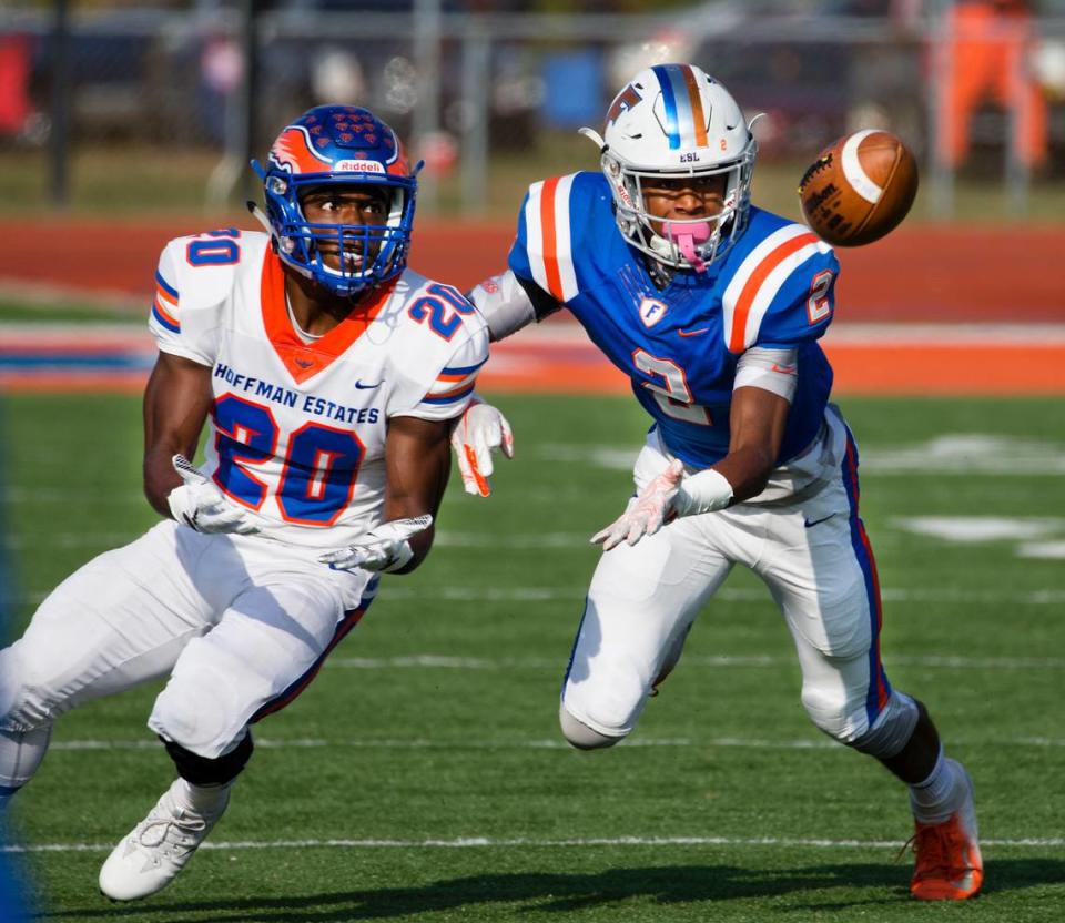 East St. Louis Antonio Johnson (2) knocks down the pass intended for Hoffman Estates Daivon Mclin during Saturday’s game at East St. Louis High School.