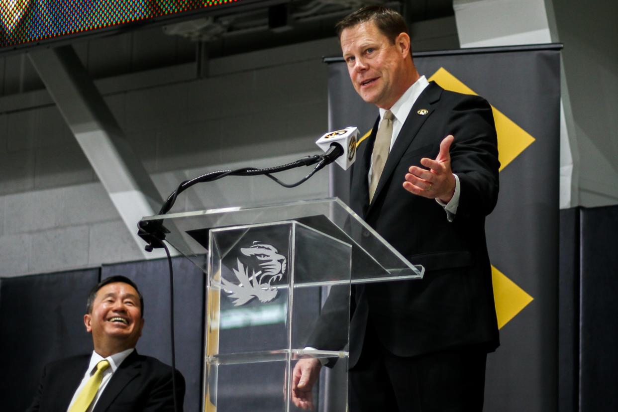 UM System President Mun Choi laughs during new Missouri athletic director Laird Veatch’s introduction speech at Stephens Indoor Facility on April 26, 2024 in Columbia, Mo.