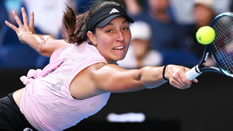 Jessica Pegula reaches to play a backhand at the Australian Open.