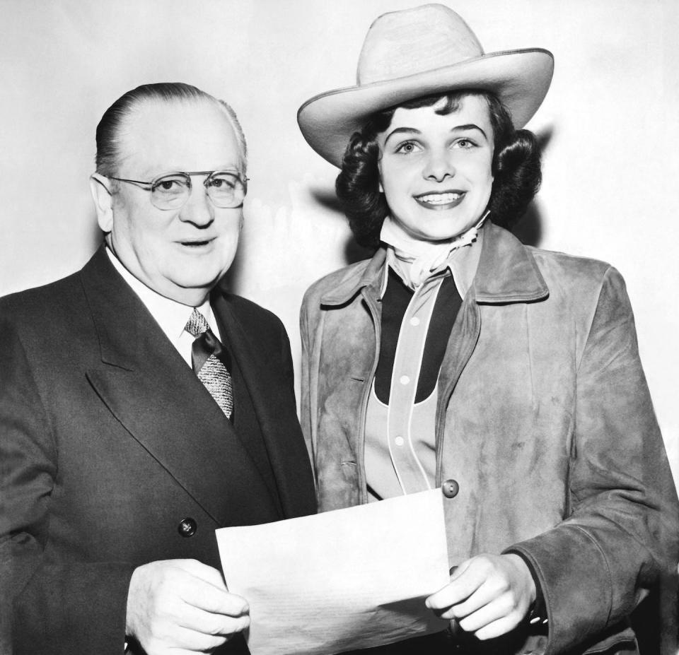 Dianne Feinstein, then Dianne Goldman, with San Francisco mayor Elmer Robinson in 1950, when she was in high school. <a href="https://www.gettyimages.com/detail/news-photo/high-school-student-dianne-goldman-wearing-a-cowboy-hat-news-photo/169071270?adppopup=true" rel="nofollow noopener" target="_blank" data-ylk="slk:Underwood Archives/Getty Images;elm:context_link;itc:0;sec:content-canvas" class="link ">Underwood Archives/Getty Images</a>