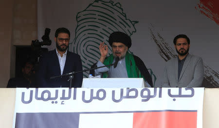 Iraqi Shi'ite cleric Moqtada al-Sadr speaks during a protest against corruption and informs his followers about his will at Tahrir Square in Baghdad, Iraq March 24, 2017. REUTERS/Alaa Al-Marjani