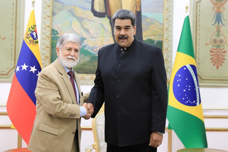 Venezuela's President Nicolas Maduro and Brazil's envoy Celso Amorim meet, in Caracas