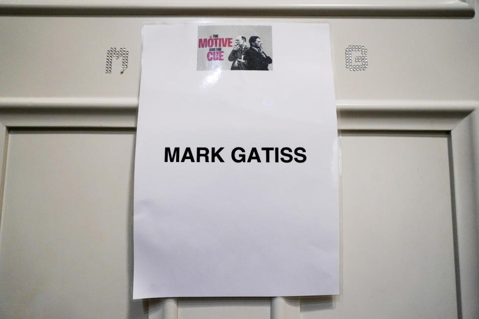 A sign on the dressing room of actor Mark Gatiss at a theater, in London, Thursday, March 14, 2024. The turbulent union of actors Richard Burton and Elizabeth Taylor that set gossip columns aflame are the subjects of “The Motive and the Cue,” a play that is being broadcast in cinemas in Britain and internationally starting Thursday as part of the National Theatre Live series. The play looks at a famous 1964 production of “Hamlet” that starred Burton and was directed by John Gielgud. Mark Gatiss plays Gielgud in the witty and moving look at fame’s fickleness and cost. (AP Photo/Alberto Pezzali)