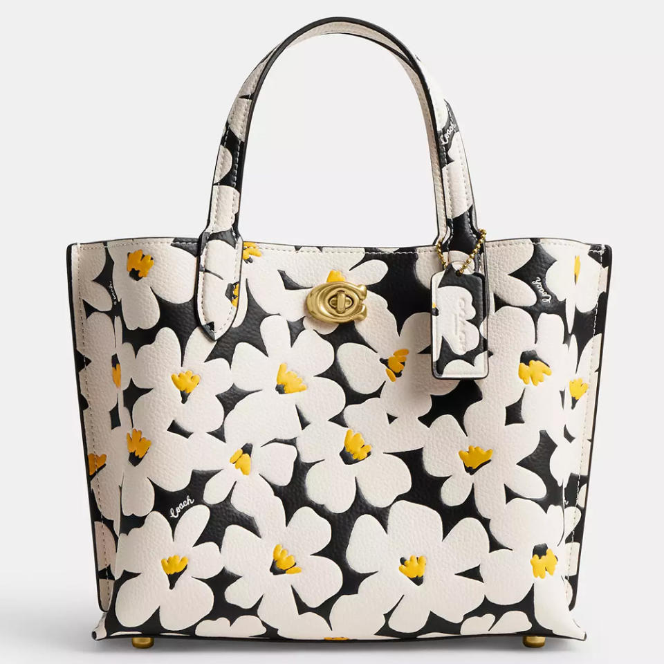 A coach floral handbag.