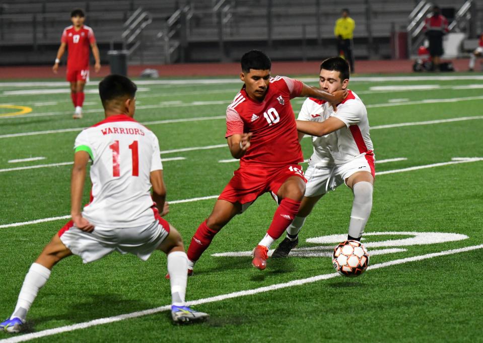 Hueneme's Andres Gutierrez tries to split the Carpinteria defense during the Vikings' 4-0 victory on Wednesday.