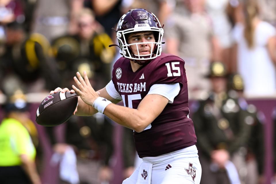 Sep 23, 2023; College Station, Texas, USA; Texas A&M Aggies quarterback Conner Weigman (15) in action during the second quarter against the Auburn Tigers at Kyle Field. Mandatory Credit: Maria Lysaker-USA TODAY Sports