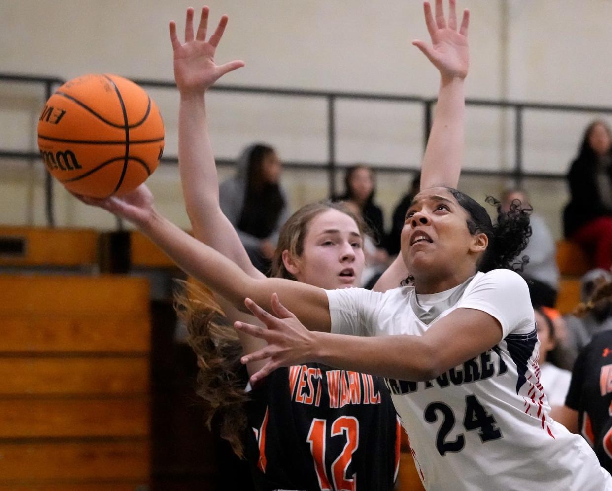 Pawtucket's Armani Rivera, right, had 20 points in Tuesday's win over Smithfield.