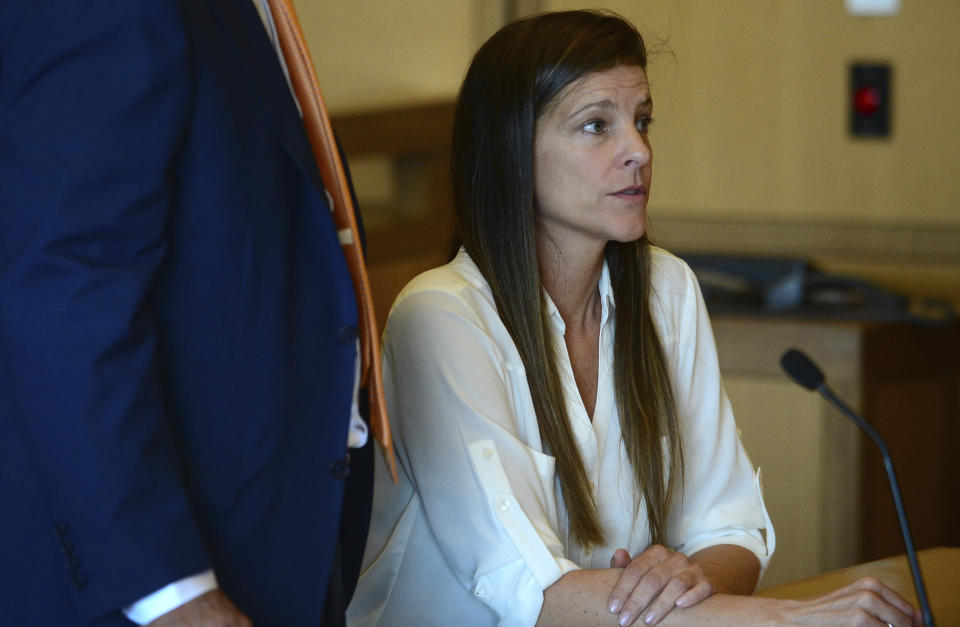 Michelle Troconis attends a hearing with her attorney Andrew Bowman in Stamford Superior Court in Stamford, Conn., on Friday, June 28, 2019. The judge agreed to issue a no-contact order designed to keep her boyfriend Fotis Dulos and his attorney away from her and also granted permission for her to travel to a friend's home in New York state. Troconis and Dulos are charged with evidence tampering and hindering prosecution in connection with the May 24 disappearance of Fotis Dulos’s wife Jennifer Dulos. (Erik Trautmann /Hearst Connecticut Media via AP, Pool)