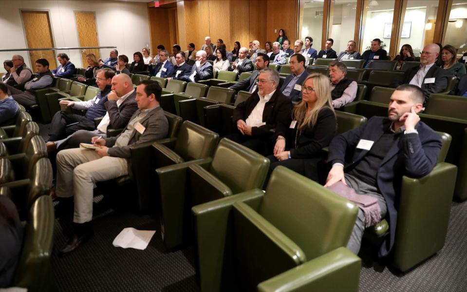 Attendees listen to a panel discussion during the Building Owners and Managers Association of Westchester (BOMA) as they discuss commercial real estate trends, Jan. 11, 2024 at the RECKSON offices in White Plains.