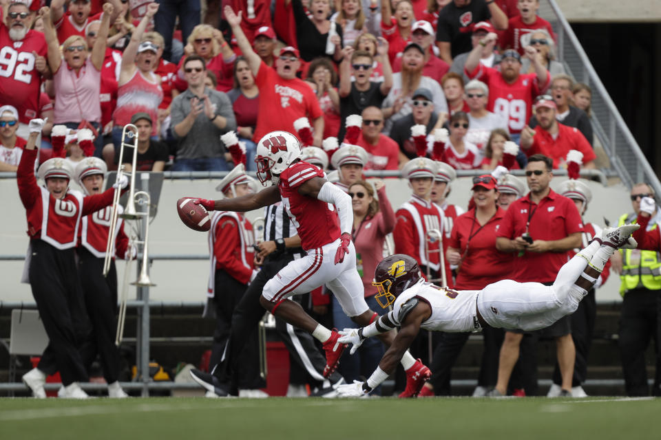 FILE - In this Sept. 7, 2019, file photo, Wisconsin wide receiver Quintez Cephus scores a touchdown against Central Michigan during the first half of an NCAA college football game, in Madison, Wis. Cephus has a team-high 720 yards and six touchdowns on 45 catches and has the 10th-ranked Badgers one win away from capturing their first Big Ten championship since 2012. But less than four months ago, football was gone, and all Cephus had was his faith and his family. (AP Photo/Andy Manis, File)