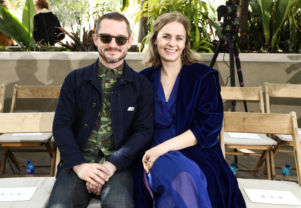 Elijah Wood and Mette-Marie Kongsved  (WWD / Penske Media via Getty Images)