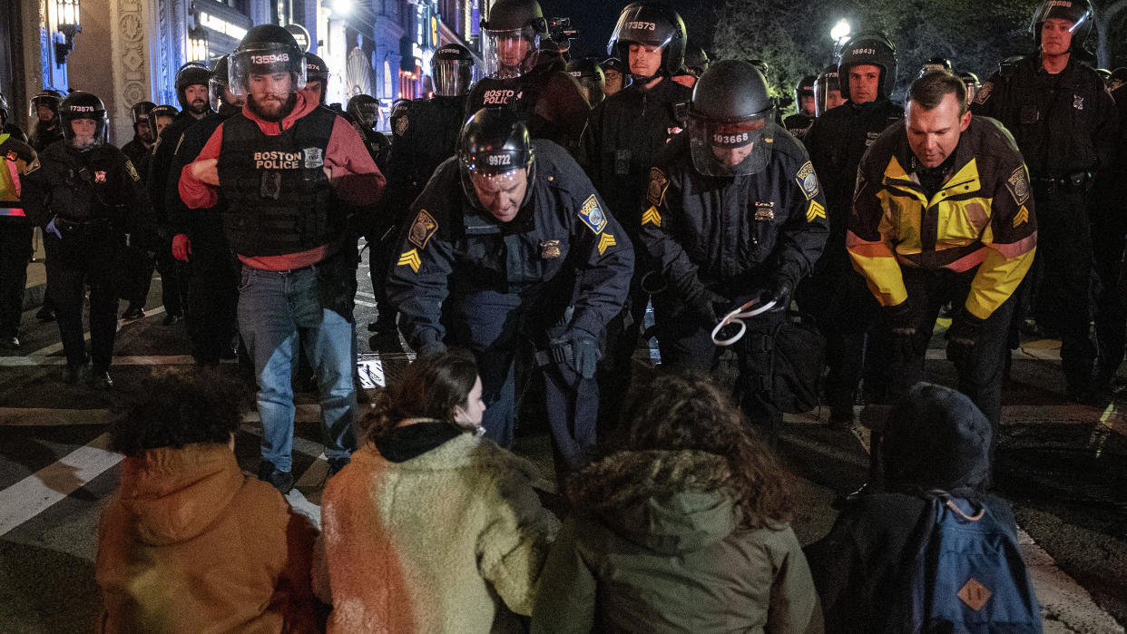 Boston Police move in to arrest pro-Palestinian supporters who were blocking the road after the Emerson College Palestinian protest camp was cleared on April 25, 2024. / Credit: JOSEPH PREZIOSO/AFP via Getty Images