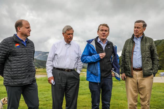 Colorado Gov. Jared Polis, U.S. Agriculture Secretary Tom Vilsack, and U.S. Sens. Michael Bennet and John Hickenlooper are pictured at Camp Hale in Colorado on Aug. 16. (Photo: Chris Dillmann/Vail Daily via AP)